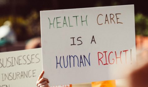 Sign that reads "Health care is a human right"